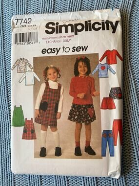 Simplicity sewing pattern  7742 girls jumper top skirt pant